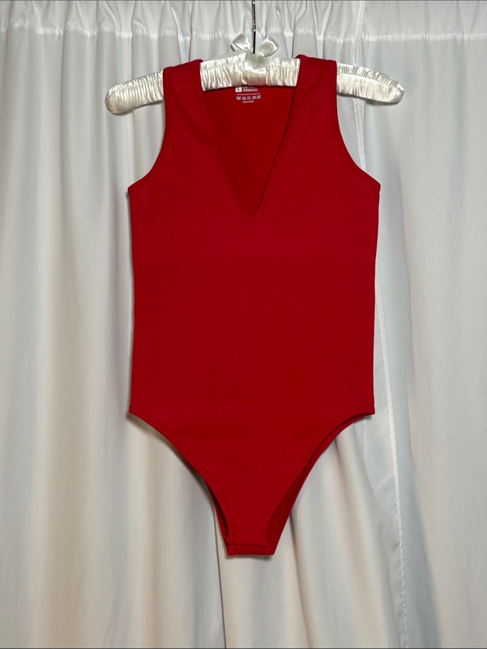 Sleeveless Red V-Neck Bodysuit